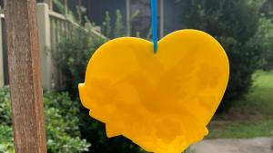 Beeswax Hummingbird in Flowers Heart