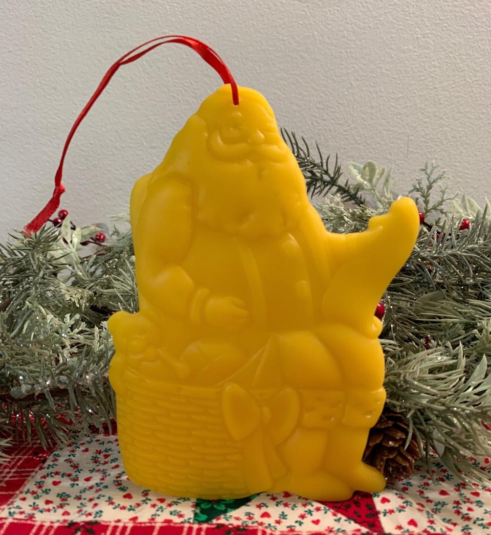 Beeswax Santa Checking his List